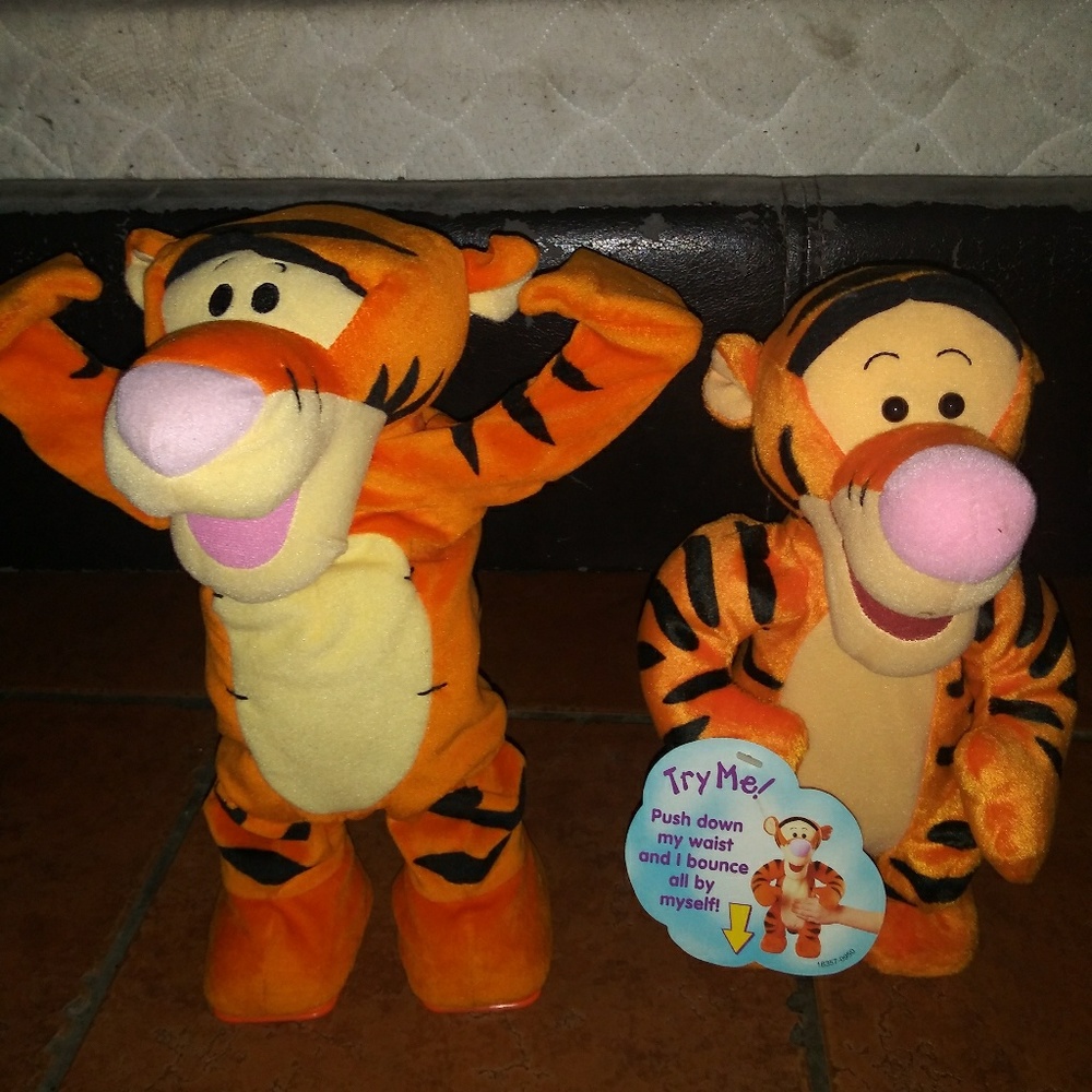 Two collectible animated Tigger toys